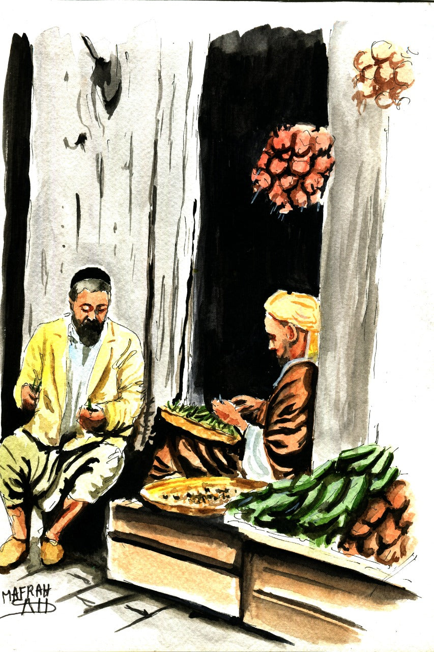 Tableau encadré de l'aquarelle « Les Marchands du Souk », accroché au mur au-dessus d'un meuble en bois bas dans un salon moderne aux teintes neutres.